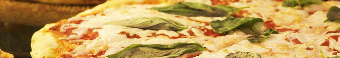 Eating Italian Pizza at Italian Family Pizza restaurant in Seattle, WA.
